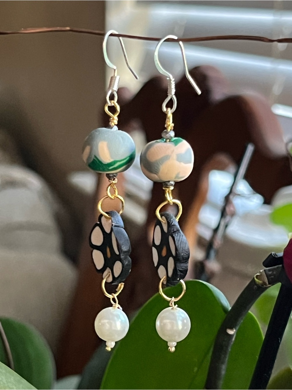 Green and White Bead Drop Earrings with Pearl Accent and Black Carved Detail